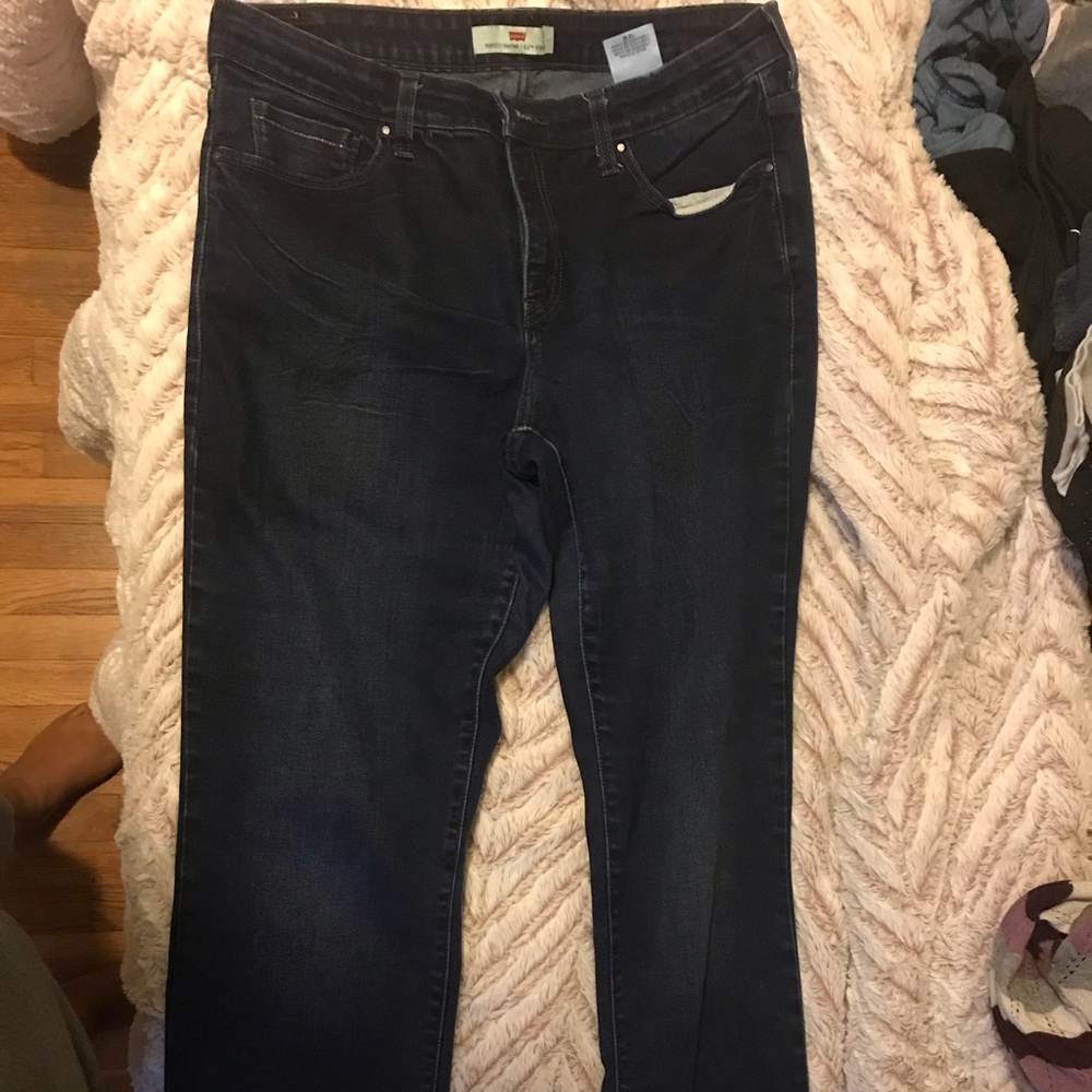 Dark wash Levi’s straight leg jeans